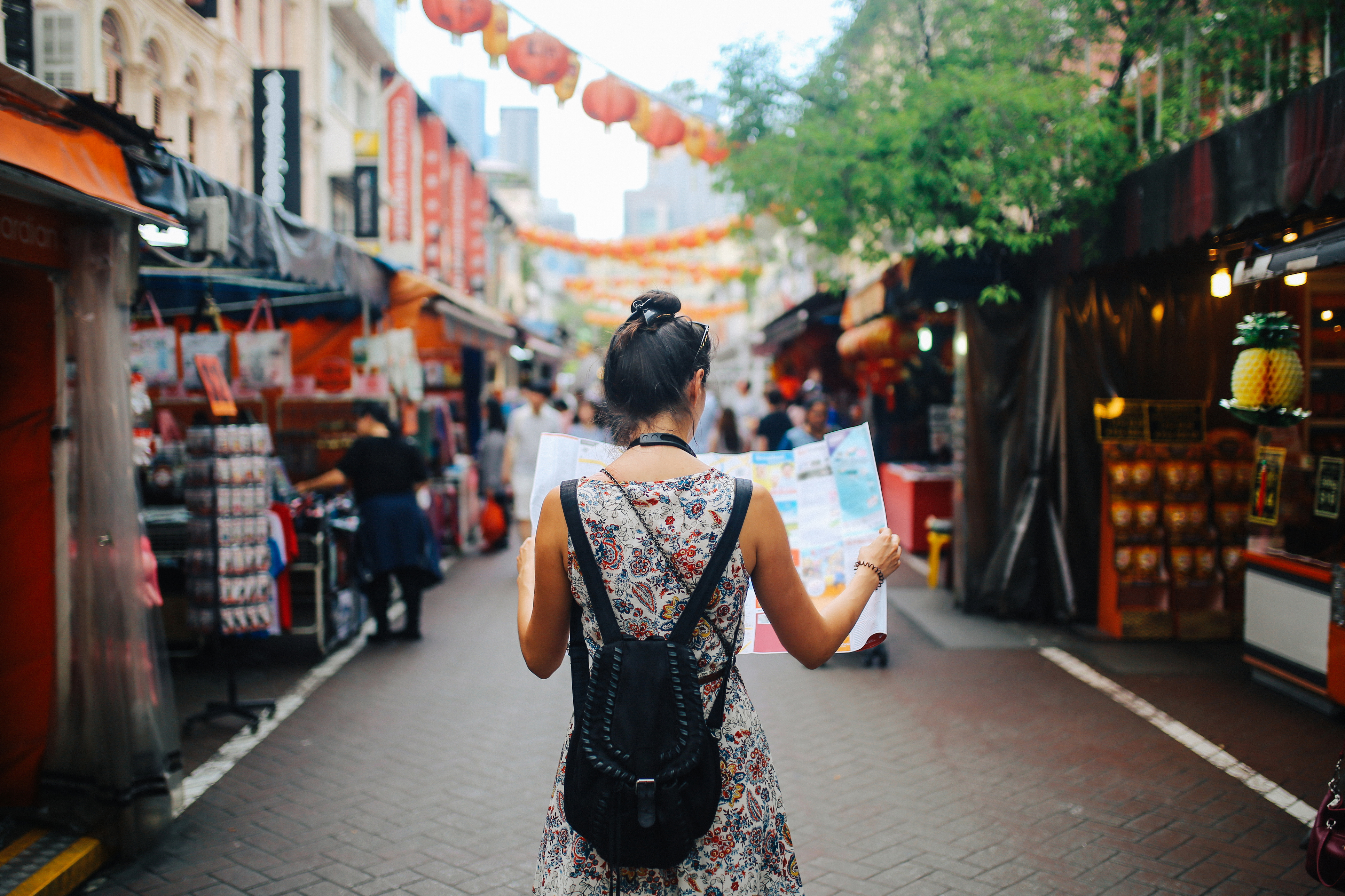 Person abroad looking at a map